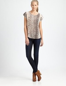 Bold snake-print adds an exotic spin to this effortless silk blouse.ScoopneckCap sleevesShirttail hemPullover styleCenter back zipperSilkDry cleanImportedModel shown is 5'11 (180cm) wearing US size Small. Bold snake-print adds an exotic spin to this effortless silk blouse.ScoopneckCap sleevesShirttail hemPullover styleCenter back zipperSilkDry cleanImportedModel shown is 5'11 (180cm) wearing US size Small.