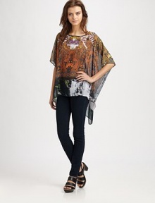 Slightly faded, paisley-printed top in a semi-sheer silhouette with three-quarter kimono sleeves and an asymmetrical hem that hits below the hips. BoatneckThree-quarter kimono sleevesAsymmetrical hem hits below the hipsPolyesterDry cleanMade in USA of imported fabricModel shown is 5'10 (177cm) wearing US size Small. Slightly faded, paisley-printed top in a semi-sheer silhouette with three-quarter kimono sleeves and an asymmetrical hem that hits below the hips. BoatneckThree-quarter kimono sleevesAsymmetrical hem hits below the hipsPolyesterDry cleanMade in USA of imported fabricModel shown is 5'10 (177cm) wearing US size Small.