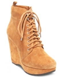 Lace up these beauties and go, go, go. BCBGeneration's Viktory lace-up platform wedge booties are made of sexy suede and feature a towering wedge heel. Lace up these beauties and go, go, go. BCBGeneration's Viktory lace-up platform wedge booties are made of sexy suede and feature a towering wedge heel.