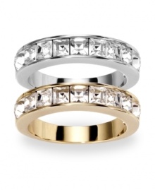 A dynamic--and dazzling!--duo: Swarovski's band rings sparkle plenty with bezel-set, square-cut clear crystals. Set in silver tone and gold tone mixed metal, they'll look stylish whether worn separately or together. Size 7. A dynamic--and dazzling!--duo: Swarovski's band rings sparkle plenty with bezel-set, square-cut clear crystals. Set in silver tone and gold tone mixed metal, they'll look stylish whether worn separately or together. Size 7.