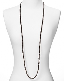 With smoky stones, Chan Luu's cotton cord necklace makes a simple statement. Forgo the fuss and layer the lengthy strand over breezy basics to be oh-so down-to-earth. With smoky stones, Chan Luu's cotton cord necklace makes a simple statement. Forgo the fuss and layer the lengthy strand over breezy basics to be oh-so down-to-earth.