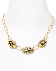 Revel in Alexis Bittar's cool elegance with this triple link necklace crafted from glistening gold plate. It rocks both a simplicity as well as a glam factor with faceted Swarovski crystals. Revel in Alexis Bittar's cool elegance with this triple link necklace crafted from glistening gold plate. It rocks both a simplicity as well as a glam factor with faceted Swarovski crystals.