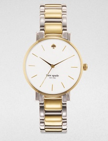 A sleek timepiece in a contrasting, two-tone design. Quartz movementWater resistant to 3 ATMRound goldtone stainless steel case, 34mm (1.3)Smooth bezelWhite dialDash hour markersSecond hand Two-tone stainless steel link braceletImported A sleek timepiece in a contrasting, two-tone design. Quartz movementWater resistant to 3 ATMRound goldtone stainless steel case, 34mm (1.3)Smooth bezelWhite dialDash hour markersSecond hand Two-tone stainless steel link braceletImported