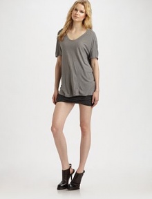 Comfy, silk-blend style with dropped shoulders and a rounded v-neck. Rounded v-neck Short sleeves Dropped shoulders Longer length hits below the hips 67% rayon/33% silk Hand wash Imported Comfy, silk-blend style with dropped shoulders and a rounded v-neck. Rounded v-neck Short sleeves Dropped shoulders Longer length hits below the hips 67% rayon/33% silk Hand wash Imported