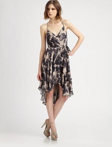 Paintbrush florals lend a touch of romance to this comely wrapped silk frock.Spaghetti strapsV necklineCrossover frontWraparound self-beltAsymmetrical hemAbout 26 from natural waistSilkDry cleanImportedModel shown is 5'9 (175cm) wearing US size Small. Paintbrush florals lend a touch of romance to this comely wrapped silk frock.Spaghetti strapsV necklineCrossover frontWraparound self-beltAsymmetrical hemAbout 26 from natural waistSilkDry cleanImportedModel shown is 5'9 (175cm) wearing US size Small.