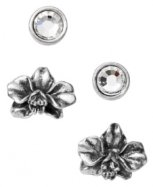 Petite and precocious. Fossil's stud earrings set features a pair of intricate orchids and round-cut clear crystals in a bezel setting. Crafted in vintage silver tone mixed metal. Approximate diameters: 1/4 inch and 5/8 inch. Petite and precocious. Fossil's stud earrings set features a pair of intricate orchids and round-cut clear crystals in a bezel setting. Crafted in vintage silver tone mixed metal. Approximate diameters: 1/4 inch and 5/8 inch.