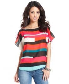 Go for statement shades with this bold, graphic-print GUESS? blouse -- perfect over white denim for summer! Go for statement shades with this bold, graphic-print GUESS? blouse -- perfect over white denim for summer!