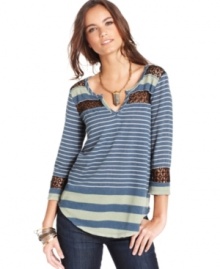 Sheer crochet insets show a hint of skin on this Free People striped top for a sexy spin on a casual basic! Sheer crochet insets show a hint of skin on this Free People striped top for a sexy spin on a casual basic!