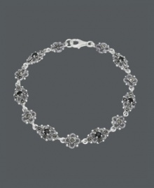 Flaunt good looks in fabulous filigree. Genevieve & Grace bracelet features an intricate link chain that highlights onyx center stones (3 mm) and glittering marcasite. Crafted in sterling silver. Approximate length: 7-1/2 inches. Flaunt good looks in fabulous filigree. Genevieve & Grace bracelet features an intricate link chain that highlights onyx center stones (3 mm) and glittering marcasite. Crafted in sterling silver. Approximate length: 7-1/2 inches.