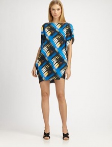 A vibrant, abstract pattern decorates this blousy silk silhouette.BoatneckDolman cap sleevesSide drapesAbout 34 from shoulder to hem93% silk/7% spandexDry cleanMade in USA of Italian fabricModel shown is 5'10½(179cm) wearing US size 4. A vibrant, abstract pattern decorates this blousy silk silhouette.BoatneckDolman cap sleevesSide drapesAbout 34 from shoulder to hem93% silk/7% spandexDry cleanMade in USA of Italian fabricModel shown is 5'10½(179cm) wearing US size 4.