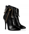 Serve up 1980s-inspired style in these ultra-luxe zipper-detailed ankle boots from Giuseppe Zanotti - Pointed toe, stiletto heel, side zip with fold-over cuff - Wear with a mini-dress or cocktail sheath