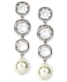 Crystal accents and white glass pearls shine bright on these Givenchy linear drop earrings. Crafted in imitation rhodium plated mixed metal. Approximate drop: 2-1/3 inches. Crystal accents and white glass pearls shine bright on these Givenchy linear drop earrings. Crafted in imitation rhodium plated mixed metal. Approximate drop: 2-1/3 inches.