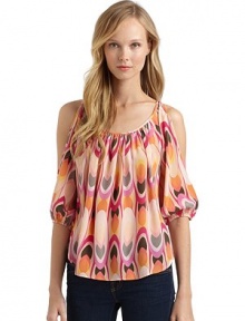 THE LOOKMulticolored oval printScoopneckCutout shouldersThree-quarter length sleeves with elastic cuffsCurved hemTHE FITAbout 25 from shoulder to hemTHE MATERIALSilkCARE & ORIGINDry cleanMade in USAModel shown is 5'8 (172½cm) wearing US size Small. THE LOOKMulticolored oval printScoopneckCutout shouldersThree-quarter length sleeves with elastic cuffsCurved hemTHE FITAbout 25 from shoulder to hemTHE MATERIALSilkCARE & ORIGINDry cleanMade in USAModel shown is 5'8 (172½cm) wearing US size Small.