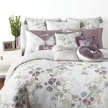 A solid plum taffeta inset peeks out from the silver pleats of this Waterford bedskirt to bring heirloom luxury to your bedroom. A solid plum taffeta inset peeks out from the silver pleats of this Waterford bedskirt to bring heirloom luxury to your bedroom.