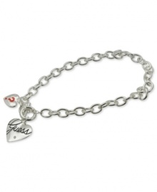 Double your love for GUESS. This charming necklace features two heart pendants with jet and red epoxy and pave crystals. Toggle closure at the front. Crafted in silver tone mixed metal. Approximate length: 16 inches. Approximate drop: 1 inch. Double your love for GUESS. This charming necklace features two heart pendants with jet and red epoxy and pave crystals. Toggle closure at the front. Crafted in silver tone mixed metal. Approximate length: 16 inches. Approximate drop: 1 inch.