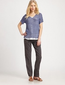 Everyday glamour is easily attainable with this knit, featuring an intricate stitch and metallic thread for a little shimmer.V-neckShort sleevesPull-on styleAbout 24 from shoulder to hem82% cotton/18% metallic threadDry cleanImported Model shown is 5'10 (177cm) wearing US size Small. Everyday glamour is easily attainable with this knit, featuring an intricate stitch and metallic thread for a little shimmer.V-neckShort sleevesPull-on styleAbout 24 from shoulder to hem82% cotton/18% metallic threadDry cleanImported Model shown is 5'10 (177cm) wearing US size Small.