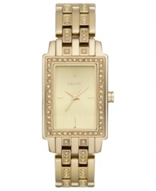 A ravishingly regal timepiece adorned with crystal accents from DKNY. A ravishingly regal timepiece adorned with crystal accents from DKNY.