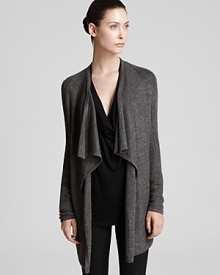 Ultra-sumptuous and soft to the touch, this HELMUT draped cardigan sweater layers over minimalist staples for an infusion of luxury and decadence into your fall wardrobe. Ultra-sumptuous and soft to the touch, this HELMUT draped cardigan sweater layers over minimalist staples for an infusion of luxury and decadence into your fall wardrobe.