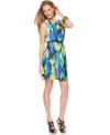 A bright graphic print makes a bold spring statement on this Vince Camuto dress -- an exposed zipper ups the edge!