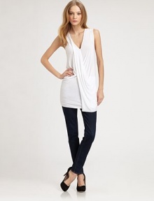 Luxe stretch jersey gathered and twisted in an elongated tunic.V necklineSleevelessGathered details at bodiceAbout 31 from shoulder to hem94% rayon/6% spandexDry cleanMade in USAModel shown is 5'9 (175cm) wearing US size Small. Luxe stretch jersey gathered and twisted in an elongated tunic.V necklineSleevelessGathered details at bodiceAbout 31 from shoulder to hem94% rayon/6% spandexDry cleanMade in USAModel shown is 5'9 (175cm) wearing US size Small.