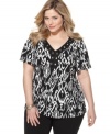 An embellished neckline elegantly accents JM Collection's short sleeve plus size top, highlighted by a bold print.