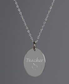 The perfect gift for your favorite educator. This oval-shaped pendant highlights the engraving Teacher with an apple. Crafted in sterling silver. Approximate length: 18 inches. Approximate drop: 3/4 inch. The perfect gift for your favorite educator. This oval-shaped pendant highlights the engraving Teacher with an apple. Crafted in sterling silver. Approximate length: 18 inches. Approximate drop: 3/4 inch.