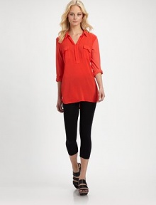 Soft jersey pairs with woven chiffon in this elongated version of the point-collar pullover.Point collarV-neckChest pocketsRoll-tab sleevesShirttail hemRayonMachine washMade in USAModel shown is 5'9 (175cm) wearing US size Small. Soft jersey pairs with woven chiffon in this elongated version of the point-collar pullover.Point collarV-neckChest pocketsRoll-tab sleevesShirttail hemRayonMachine washMade in USAModel shown is 5'9 (175cm) wearing US size Small.