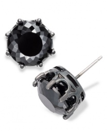 Black is back in this pair of oversized stud earrings from Juicy Couture. Cast in silver tone brass crowns, the faceted jet black cubic zirconia (8 ct. t.w) add a sense of intrigue and style. Approximate diameter: 3/8 inch. Black is back in this pair of oversized stud earrings from Juicy Couture. Cast in silver tone brass crowns, the faceted jet black cubic zirconia (8 ct. t.w) add a sense of intrigue and style. Approximate diameter: 3/8 inch.
