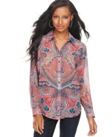 INC's floaty button-front petite shirt offers a traditional look with a modern twist, thanks to a paisley print in a bold color palette. INC's floaty button-front petite shirt offers a traditional look with a modern twist, thanks to a paisley print in a bold color palette.