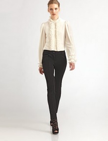 Sumptuous silk, tailored in a classic button-down style with a flurry of ruffles on the collar, cuffs and button placket.Ruffled stand collarLong puff sleeves with buttoned, ruffled cuffsButton frontBack pleats at yokeAbout 25 from shoulder to hemSilkDry cleanMade in Italy of imported fabric Model shown is 5'10 wearing US size 4. Sumptuous silk, tailored in a classic button-down style with a flurry of ruffles on the collar, cuffs and button placket.Ruffled stand collarLong puff sleeves with buttoned, ruffled cuffsButton frontBack pleats at yokeAbout 25 from shoulder to hemSilkDry cleanMade in Italy of imported fabric Model shown is 5'10 wearing US size 4.