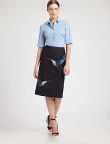 Impeccably tailored cotton, accented with matching buttons and wide-cuffed sleeves.Point collarButton frontShort sleeves with wide cuffsAbout 24 from shoulder to hem74% cotton/5% spandex/21% nylonDry cleanMade in Italy of imported fabricModel shown is 5'11½ (181cm) wearing US size 4. Impeccably tailored cotton, accented with matching buttons and wide-cuffed sleeves.Point collarButton frontShort sleeves with wide cuffsAbout 24 from shoulder to hem74% cotton/5% spandex/21% nylonDry cleanMade in Italy of imported fabricModel shown is 5'11½ (181cm) wearing US size 4.