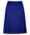 Colorblock your look with a chic feminine edge in Missoni Ms characteristic textural knit dark blue skirt - Flat elasticized waistband, contrast patterned border around hemline, black satin lining - Fitted waist, flared silhouette - Wear with a bright knit top and sophisticated heels