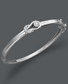 Sophisticated sparkle that's eternally stylish. Everlon's chic, knotted bangle features a smooth, sterling silver setting that cradles gleaming, round-cut diamonds (1/4 ct. t.w.). Approximate diameter: 2-1/2 inches. Sophisticated sparkle that's eternally stylish. Everlon's chic, knotted bangle features a smooth, sterling silver setting that cradles gleaming, round-cut diamonds (1/4 ct. t.w.). Approximate diameter: 2-1/2 inches.
