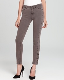 Make a military-inspired statement in these J Brand skinny jeans with button embellishments at the ankles for authentic appeal. Dress the look up with pumps or rock downtown cool with booties. Make a military-inspired statement in these J Brand skinny jeans with button embellishments at the ankles for authentic appeal. Dress the look up with pumps or rock downtown cool with booties.