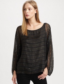 A billowy chiffon design mixes with edgy metallic stripes for stand-out style. BoatneckLong sheer dolman sleeves with elastic cuffsAbout 25 from shoulder to hem88% silk/12% metallic fibersDry cleanImportedModel shown is 5'9 (175cm) wearing US size Small.This style runs true to size. We recommend ordering your usual size for a standard fit. A billowy chiffon design mixes with edgy metallic stripes for stand-out style. BoatneckLong sheer dolman sleeves with elastic cuffsAbout 25 from shoulder to hem88% silk/12% metallic fibersDry cleanImportedModel shown is 5'9 (175cm) wearing US size Small.This style runs true to size. We recommend ordering your usual size for a standard fit.