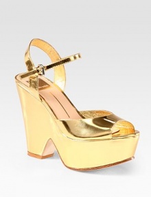 Metallic leather go-to with an adjustable ankle strap and a sensationally sculpted heel. Self-covered heel, 4½ (115mm)Covered platform, 1½ (40mm)Compares to a 3 heel (75mm)Metallic leather upperLeather lining and solePadded insoleImportedOUR FIT MODEL RECOMMENDS ordering true size. Metallic leather go-to with an adjustable ankle strap and a sensationally sculpted heel. Self-covered heel, 4½ (115mm)Covered platform, 1½ (40mm)Compares to a 3 heel (75mm)Metallic leather upperLeather lining and solePadded insoleImportedOUR FIT MODEL RECOMMENDS ordering true size.