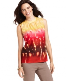 Jones New York Signature's punchy printed top instantly livens up anything from khakis to jeans. Transition it to fall with a cardigan or blazer! Jones New York Signature's punchy printed top instantly livens up anything from khakis to jeans. Transition it to fall with a cardigan or blazer!