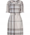 Both casual and chic with its iconic check, this crinkle cotton dress from Burberry Brit is a sophisticated choice for dressing up warm weather looks - Bateau neckline, elbow-length sleeves, buttoned cuffs, metal back zip, belted waistline, side belt loops - Tailored fit - Wear with flats and a sleek leather tote