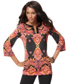Bugle beads add shine to a richly-colored, printed tunic from INC. The flattering, wrinkle-resistant jersey fabric makes this a great choice for everyday wear. Bugle beads add shine to a richly-colored, printed tunic from INC. The flattering, wrinkle-resistant jersey fabric makes this a great choice for everyday wear.