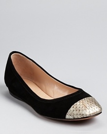 A metallic, snakeskin embossed cap toe tops off a suede silhouette from Jean-Michel Cazabat. A metallic, snakeskin embossed cap toe tops off a suede silhouette from Jean-Michel Cazabat.