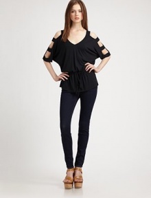 Cutout dolman sleeves and a drawstring drop waist add unexpected edge to this supremely soft, jersey v-neck. V-neckCutout three-quarter dolman sleevesDrawstring drop waist96% rayon/4% spandexHand washMade in USAModel shown is 5'10 (177cm) wearing US size Small. Cutout dolman sleeves and a drawstring drop waist add unexpected edge to this supremely soft, jersey v-neck. V-neckCutout three-quarter dolman sleevesDrawstring drop waist96% rayon/4% spandexHand washMade in USAModel shown is 5'10 (177cm) wearing US size Small.