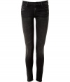 The ultimate edgy must-have, these luxe jeans from It denim brand Mother are the favorite skinnies of the fashion flock - Classic five-pocket styling, stylishly destroyed washed black denim, skinny leg - Form-fitting - Style with an oversized cashmere pullover, biker boots and a leather jacket