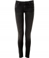 The ultimate edgy must-have, these luxe jeans from It denim brand Mother are the favorite skinnies of the fashion flock - Classic five-pocket styling, stylishly destroyed washed black denim, skinny leg - Form-fitting - Style with an oversized cashmere pullover, biker boots and a leather jacket