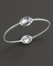 From the Silver collection, two clear quartz stations on a hammered bangle in sterling silver. Designed by Ippolita. From the Silver collection, two clear quartz stations on a hammered bangle in sterling silver. Designed by Ippolita.