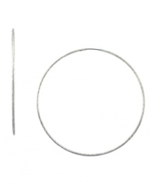 Big time style. Jessica Simpson's not-so-subtle hoop earrings make a bold statement. Crafted in thin silver tone mixed metal. Approximate diameter: 3 inches. Big time style. Jessica Simpson's not-so-subtle hoop earrings make a bold statement. Crafted in thin silver tone mixed metal. Approximate diameter: 3 inches.