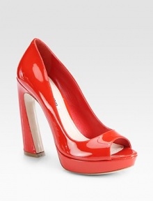 Patent leather platform peep toe with an architectural flared heel. Self-covered heel, 5 (125mm)Covered platform, 1 (25mm)Compares to a 4 heel (100mm)Patent leather upperLeather lining and solePadded insoleMade in ItalyOUR FIT MODEL RECOMMENDS ordering one half size up as this style runs small. Patent leather platform peep toe with an architectural flared heel. Self-covered heel, 5 (125mm)Covered platform, 1 (25mm)Compares to a 4 heel (100mm)Patent leather upperLeather lining and solePadded insoleMade in ItalyOUR FIT MODEL RECOMMENDS ordering one half size up as this style runs small.
