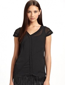 Diaphanous rayon top has tonal piped seams and asymmetrical V neckline for a forward thinking design.Asymmetrical V-neck Short sleeves Pullover style Tonal piped seams, front and back About 24 from shoulder to hem Rayon Dry clean Made in ItalyPlease note: Camisole sold separately. Diaphanous rayon top has tonal piped seams and asymmetrical V neckline for a forward thinking design.Asymmetrical V-neck Short sleeves Pullover style Tonal piped seams, front and back About 24 from shoulder to hem Rayon Dry clean Made in ItalyPlease note: Camisole sold separately.