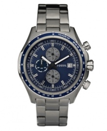 A bold, blue face pops on the muted backdrop of this wear-everywhere watch by Fossil. A bold, blue face pops on the muted backdrop of this wear-everywhere watch by Fossil.