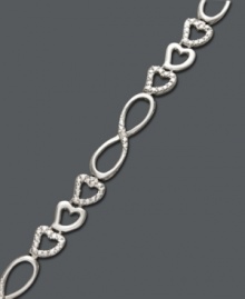 A look you'll absolutely adore! Victoria Townsend presents a fabulous, new design that highlights three, interlocking hearts and figure eight links. Crafted in sterling silver with sparkling diamond accents. Approximate length: 7 inches. A look you'll absolutely adore! Victoria Townsend presents a fabulous, new design that highlights three, interlocking hearts and figure eight links. Crafted in sterling silver with sparkling diamond accents. Approximate length: 7 inches.