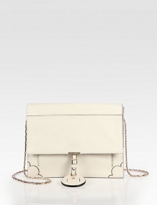 Chic and ladylike leather silhouette, with a delicate chain shoulder strap and scalloped detailing at the bottom corners.Goldtone chain strap, 19 drop Snap flap closure with signature buckle detail Outside open pocket Inside zip pocket Fully lined 9¾W X 8H X 2½D Made in Italy Chic and ladylike leather silhouette, with a delicate chain shoulder strap and scalloped detailing at the bottom corners.Goldtone chain strap, 19 drop Snap flap closure with signature buckle detail Outside open pocket Inside zip pocket Fully lined 9¾W X 8H X 2½D Made in Italy